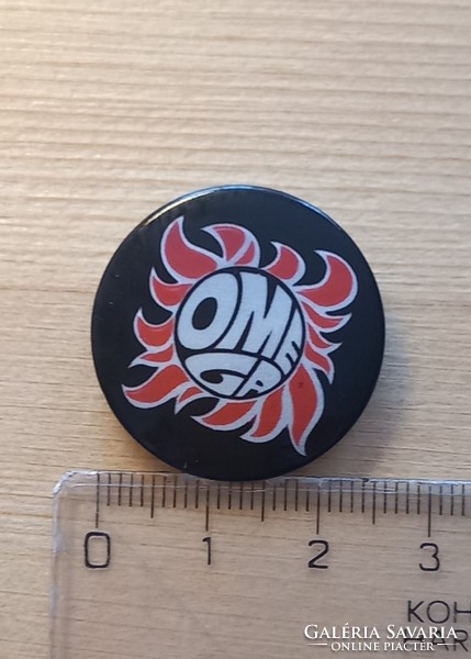 Omega badge/pin