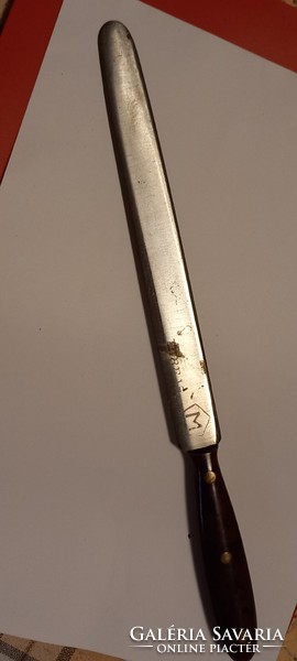 Leaf-opening knife with unintelligible markings