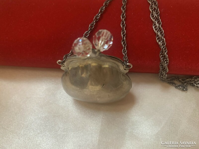 Antique change holder with polished mountain crystal. Silver
