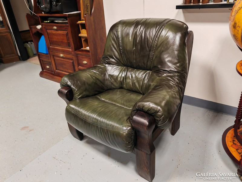 A very comfortable, large, classic genuine leather armchair in beautiful condition