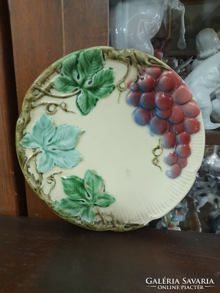 Old dome wine grape pattern glazed ceramic wall plate. Marked. 17.5 Cm.