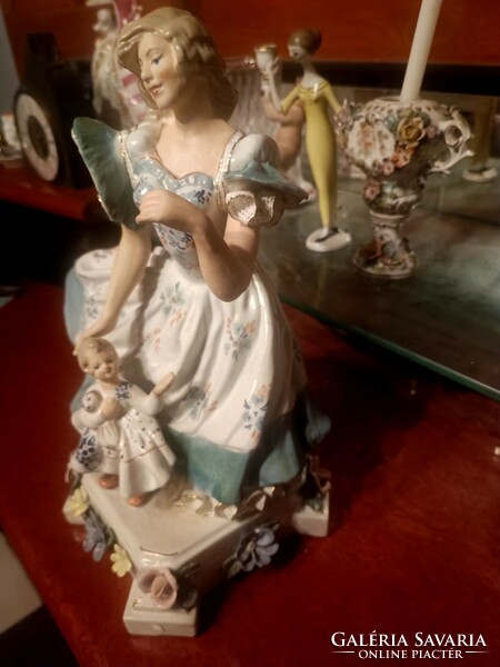 Large, rare porcelain mother with child.