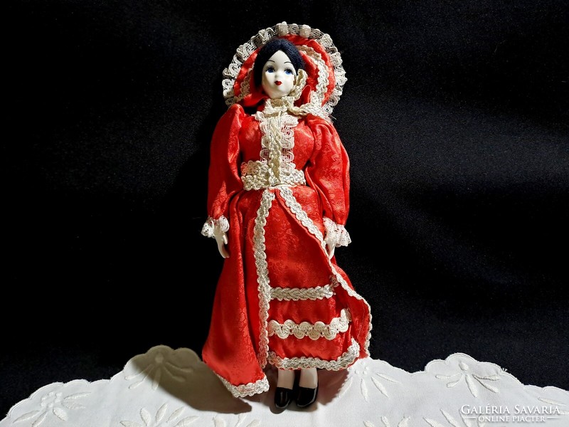 Retro porcelain (head, hands, feet) doll in red clothes 21 cm
