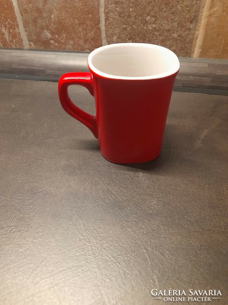 Nescafe mug is smaller