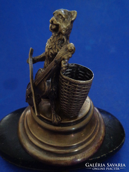 Antique toothpick holder with a figure of a musician cat