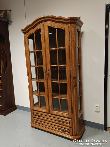 Oak two-door, two-drawer display cabinet in immaculate condition.