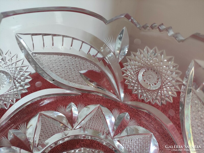 A polished lead crystal bowl with a lip rotation pattern of considerable weight. From the legacy of photographer G. 