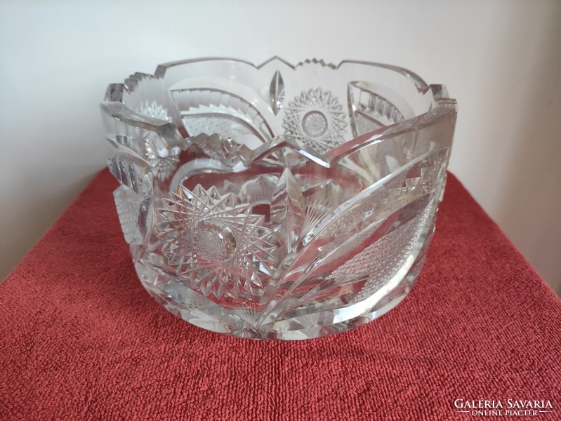 A polished lead crystal bowl with a lip rotation pattern of considerable weight. From the legacy of photographer G. 