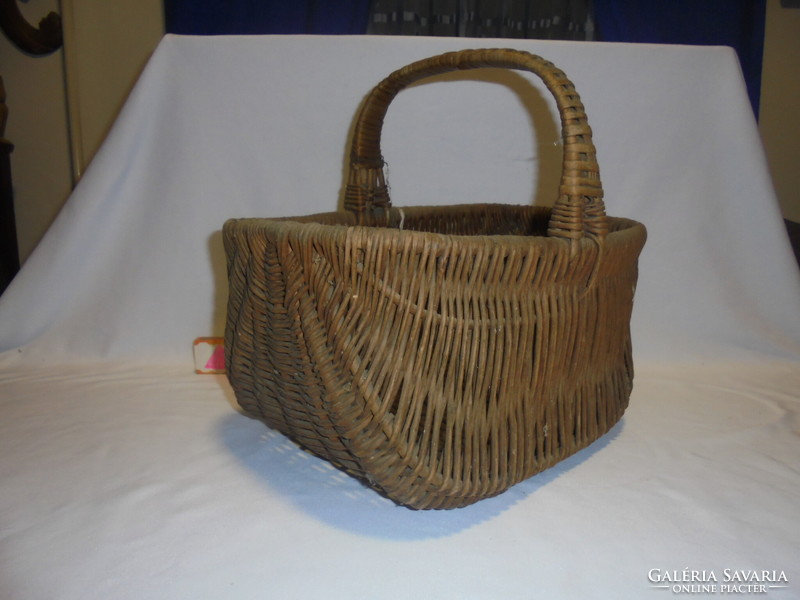 Old cane wicker market basket, rake - piece of nostalgia