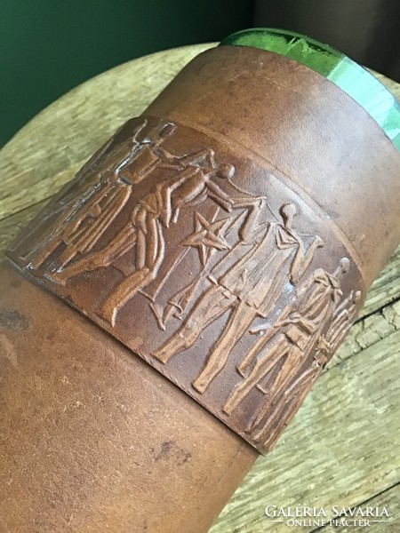 Glass vase covered with old applied art leather