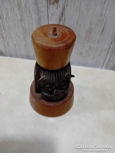 Wooden candle holder with bush head