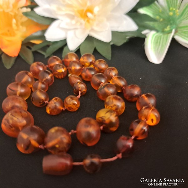 Old handmade amber necklaces.