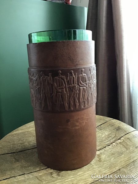 Glass vase covered with old applied art leather