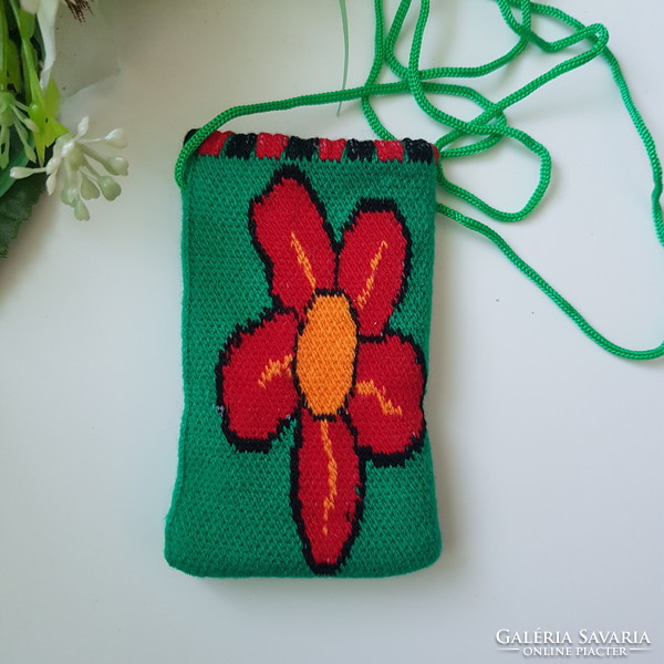 New, flower-patterned, green, retro textile phone case with a cord that can be hung around the neck