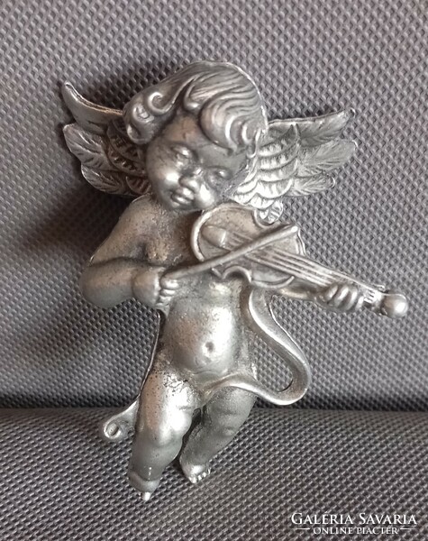 Metal putto, angel face, difficult to negotiate, art deco design