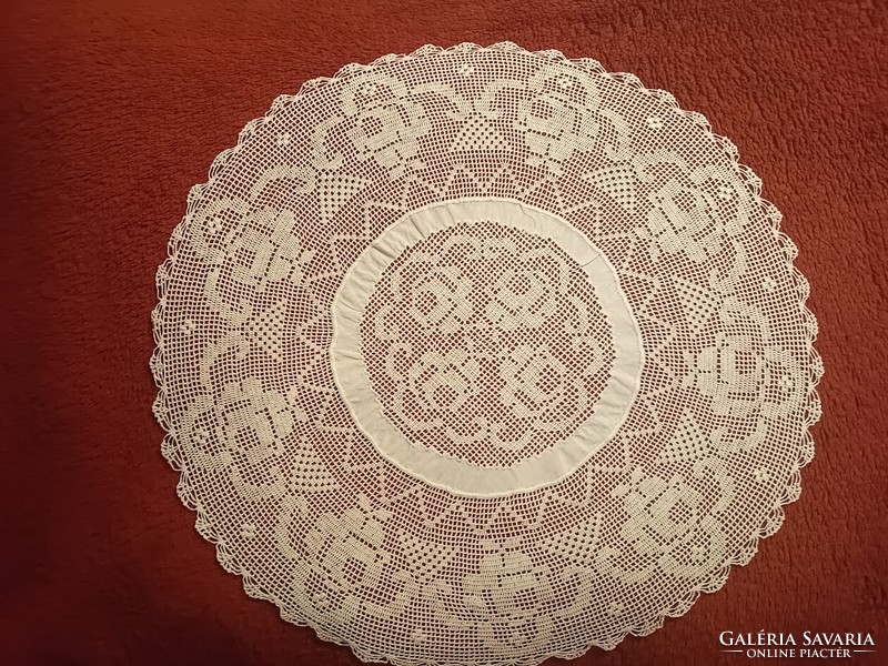 Old pink, round lace tablecloth