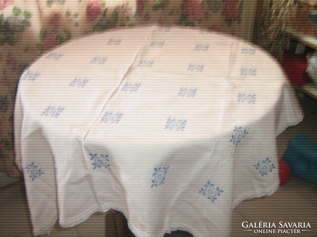 Beautiful embroidered white lacy damask tablecloth