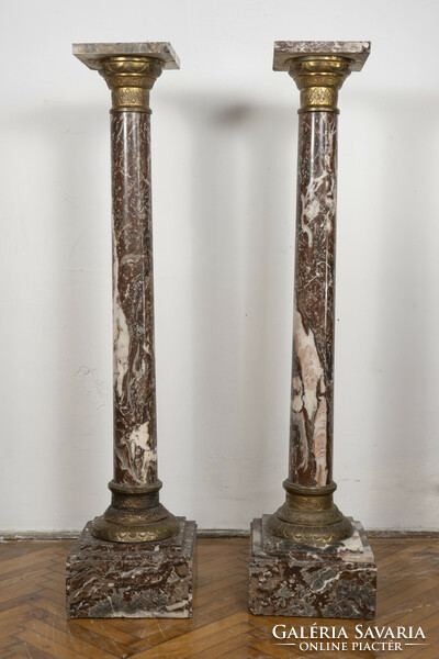 Pair of antique French marble pedestals with gilded bronze decoration