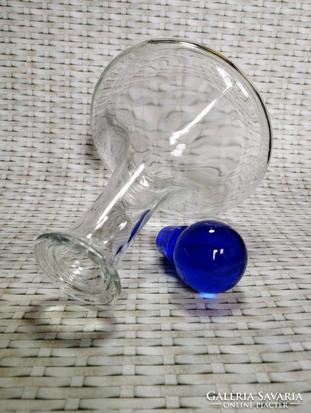 Decorative glass with blue crystal plug