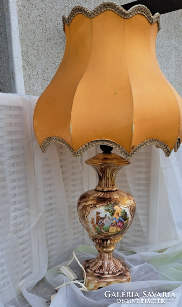 A beautiful antique scene lamp