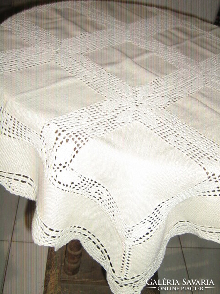 Wonderful white / ecru tablecloth with beautiful hand-crocheted floral pattern
