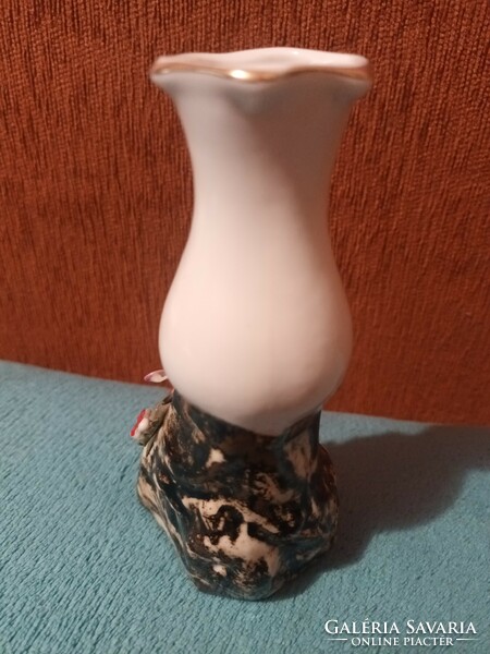 Beautiful small porcelain vase with flower pattern