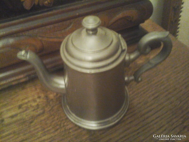Antique pewter jug with spout