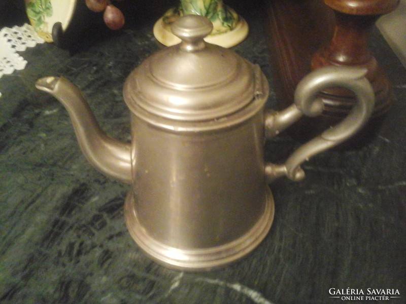 Antique pewter jug with spout