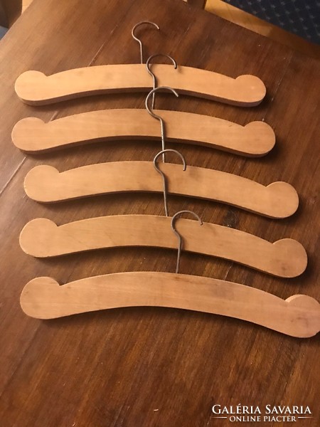 Retro clothes hanger. Old children's shoulder tree carved from wood. Size: 34x4.5 cm