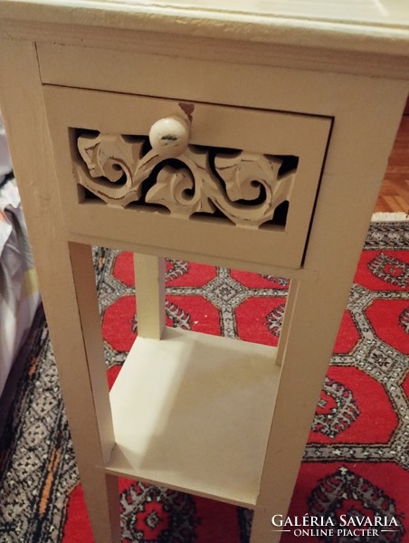 Carved, painted, wooden drawer stand with accessory holder
