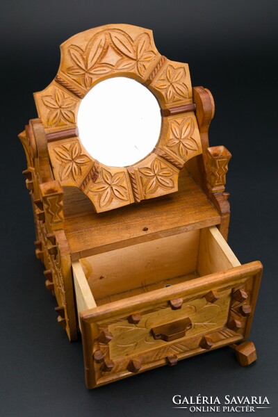 Wooden, hand-carved, mirrored, small box with drawers, made in 1976.