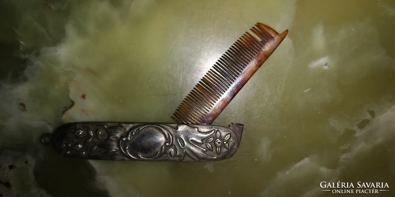 Silver-handled whisker tortoise shell comb