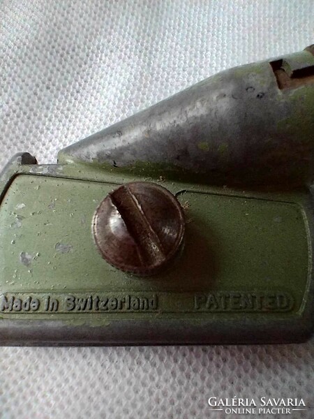 Antique, blade-operated Swiss pencil sharpener. Collectable