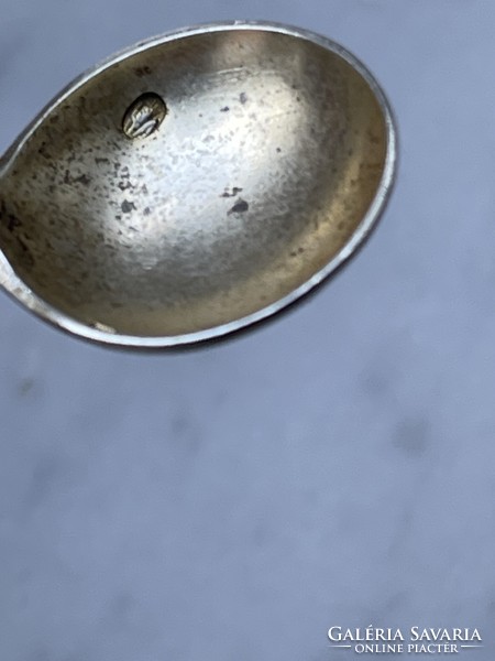 Antique monogrammed silver spice spoon, the inside of the small spoon is gilded.