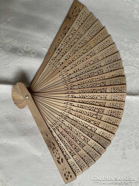 Openwork wooden fan