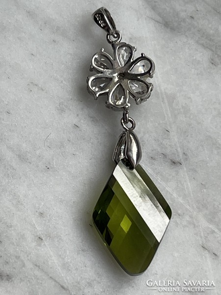 Beautiful silver pendant with green and white stones, much more beautiful in reality.
