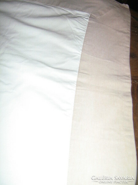 Beautiful bedspread in white color with pale mauve piping