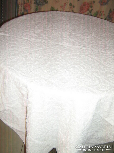 A white towel with a printed pattern in a beautiful material