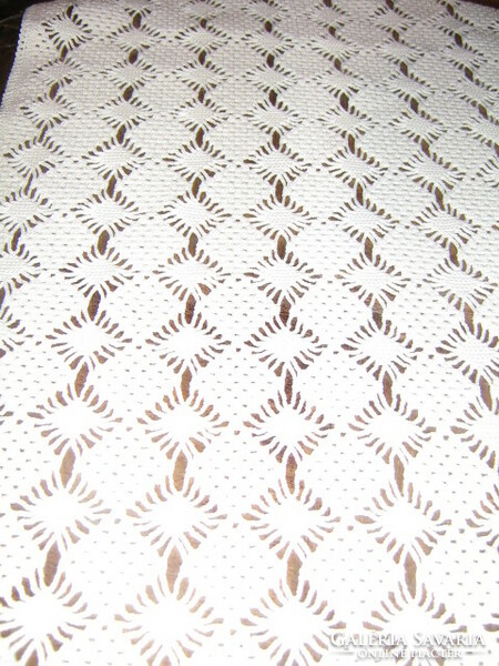 Beautiful handmade crocheted snow-white tablecloth