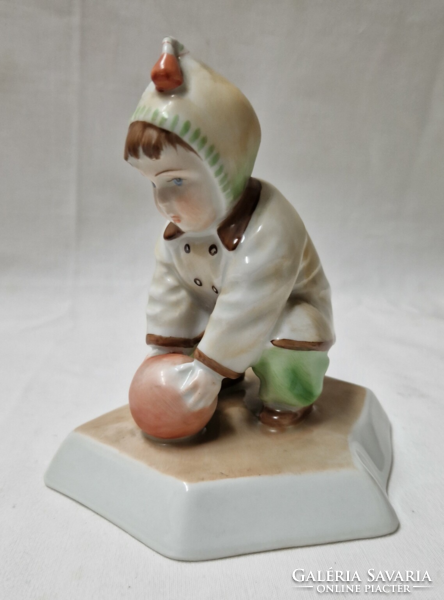 Porcelain figurine of Zsolnay ball boy or child designed by András Sinkó in perfect condition 14 cm.