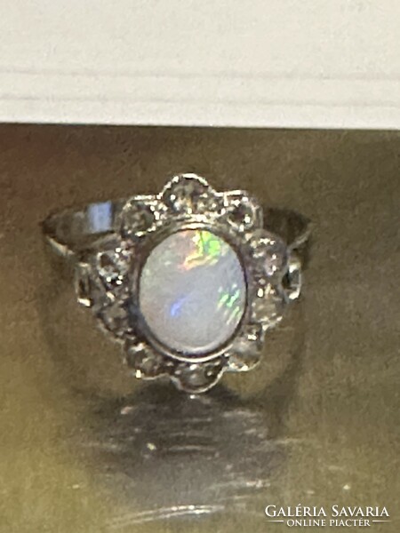 Very nice antique 14 kr gold ring decorated with beautiful opals and diamonds for sale! Price: 108,000.-