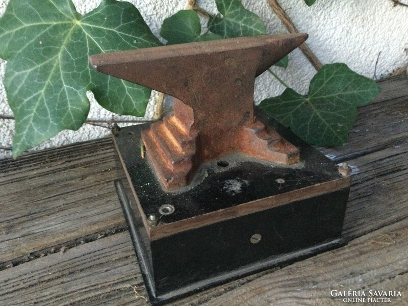 A small iron, perhaps a goldsmith's anvil