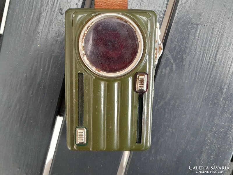 Nicely working, never used, old color-changing military flashlight