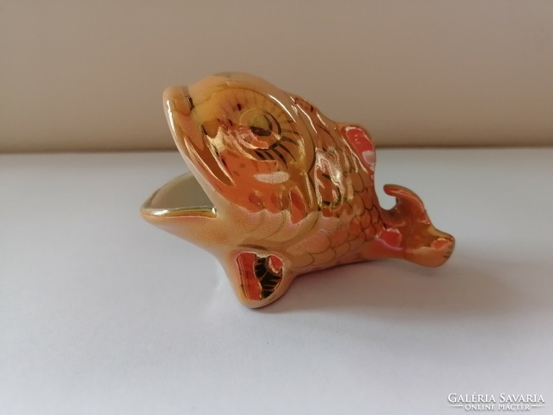 Ceramic craftsman's iridescent fish