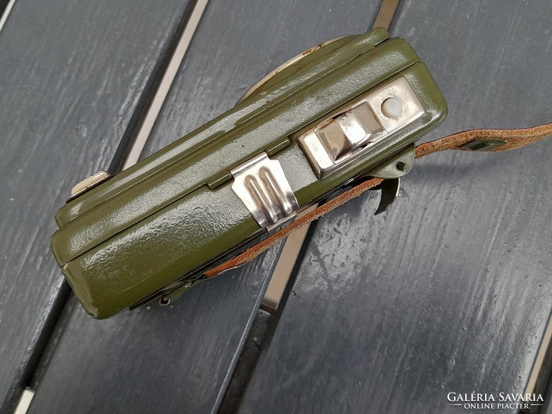 Nicely working, never used, old color-changing military flashlight