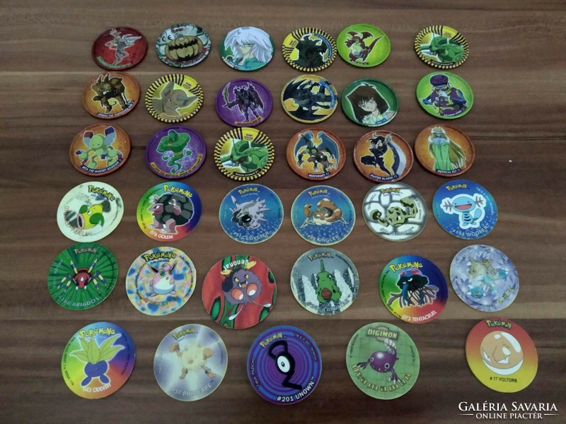 18 db Megaman Tazo, fémből (Yu Gi Oh) és 17 db Pokemon Tazo, egyben
