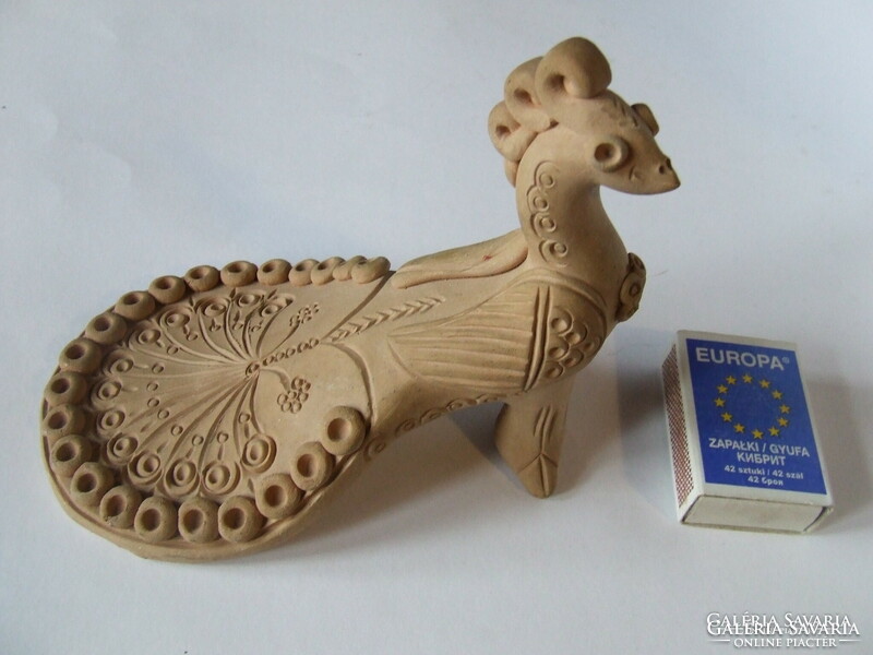 Old, interestingly depicted peacock bird ceramic figure with Cyrillic lettering-probably Russian
