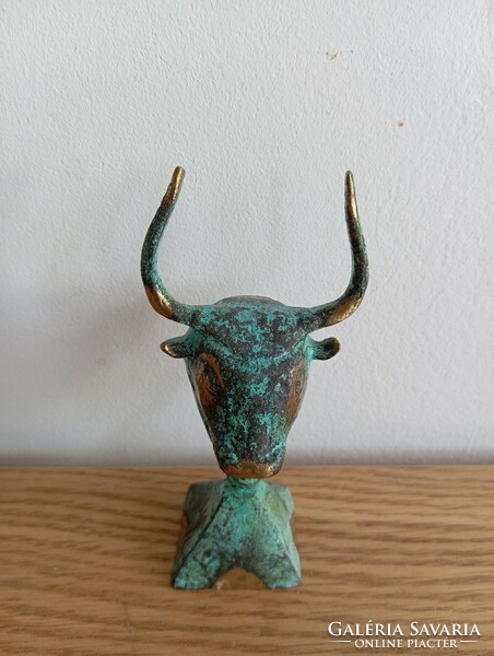 Copper bull statue. Goldsmith's work, metal work.