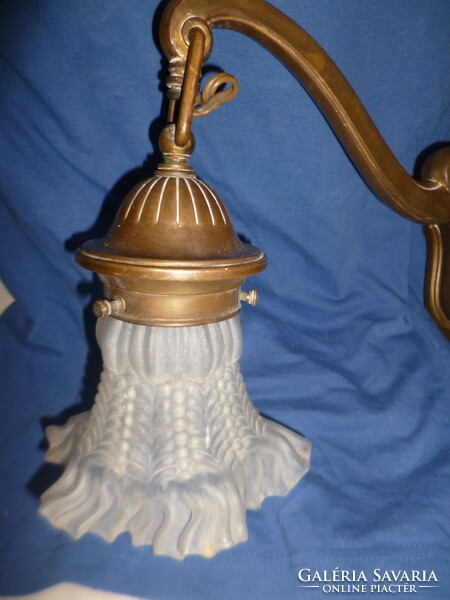 Old bronze wall arm lamp