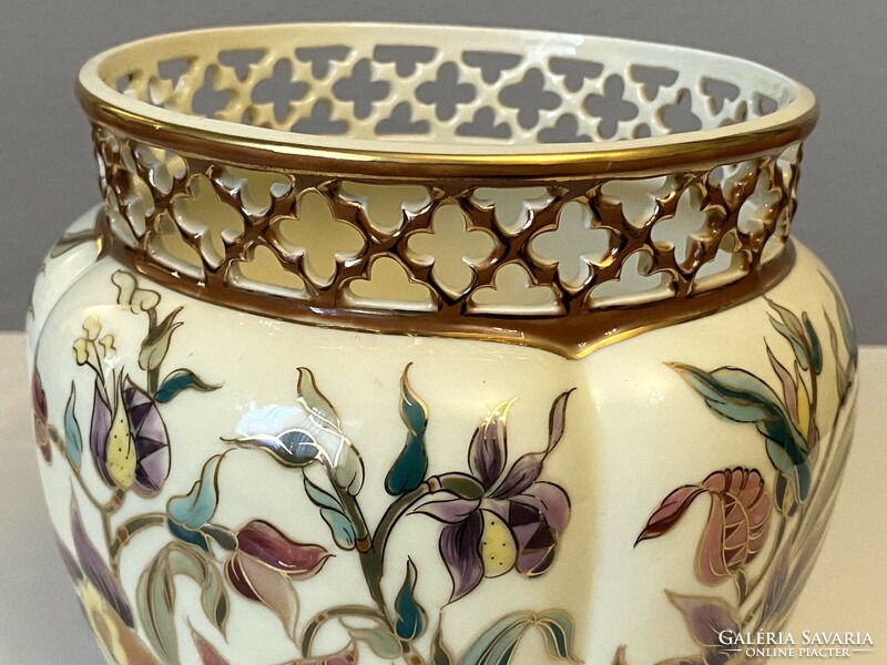 A porcelain ornament made by the master painter Zsolnay, a large floral pot